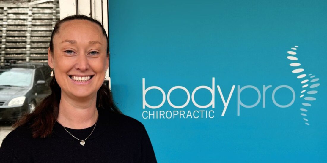 Claire in front of Body Pro Chiropractic
